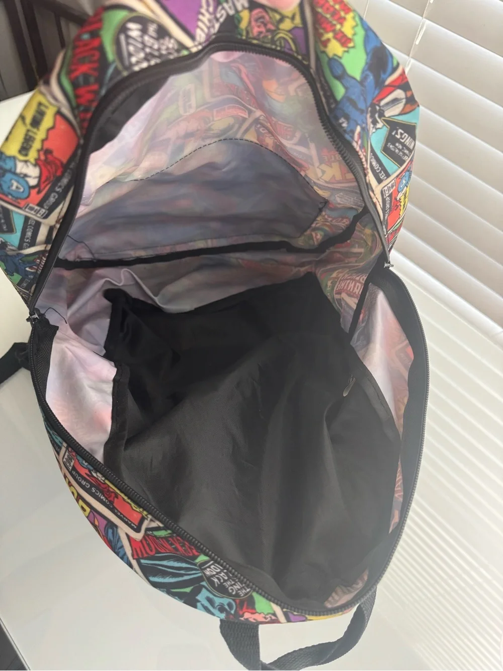 Marvel Multicolor Comic Collage Backpack with Captain America Shield Accent